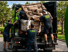 Junk removal crew loading furniture
